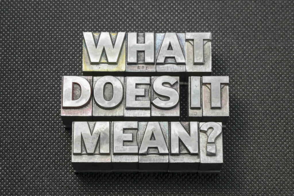 "what does it mean?" steel blocks of letters
