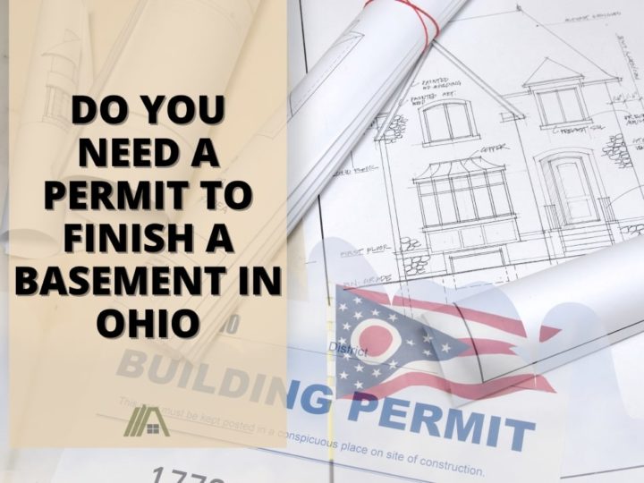 Flag of Ohio over a Building permit and architectural plans; Do You Need A building Permit to Finish A Basement in Ohio
