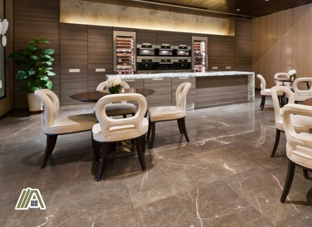 Kitchen and dining area with dark gray marble flooring