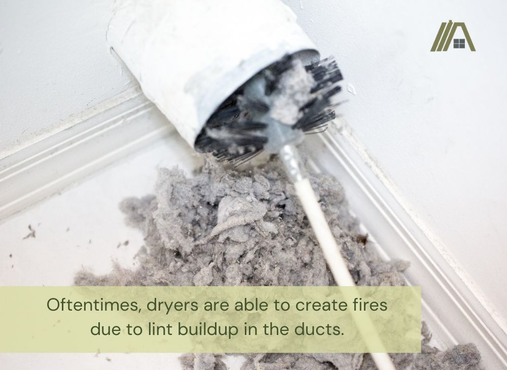 Duct full of lint with a text saying _Oftentimes, dryers are able to create fires due to lint buildup in the ducts