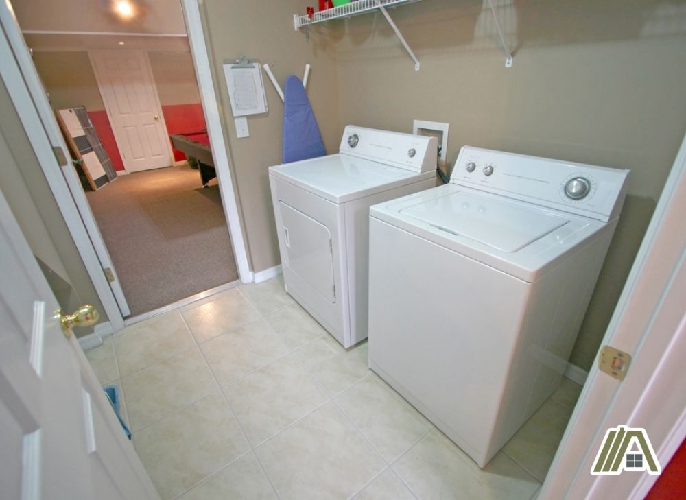 Washing machine and gas dryer inside the laundry room